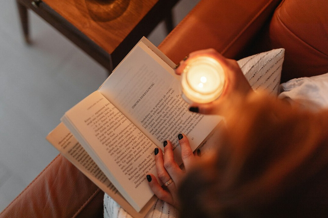 woman reading thriller book