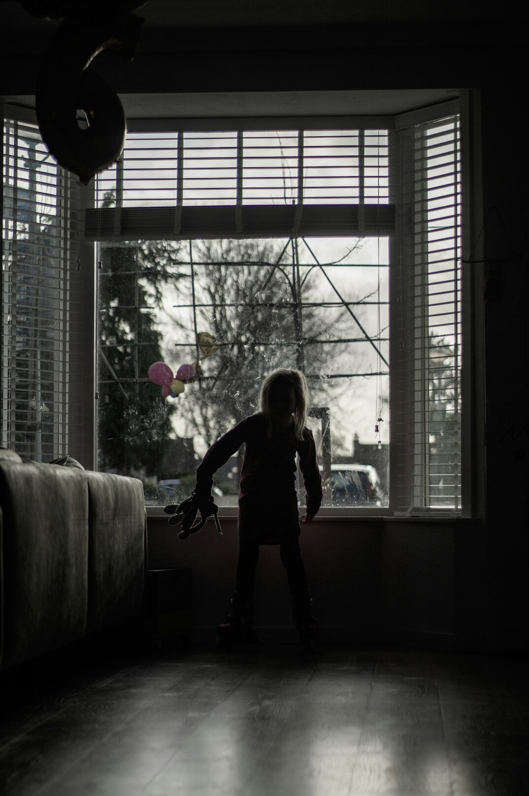 shadowy figure in dark room